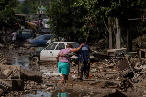Death toll from torrential rains in…