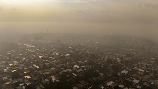 Amazon fires trap Manaus in smoke as…