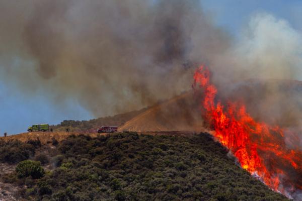 As Wildfire Grows Near Ex-Nuclear Site,…