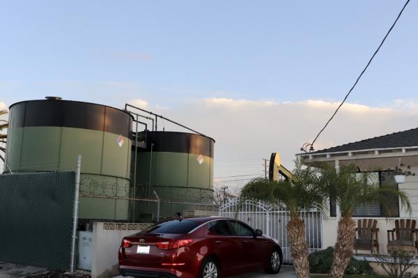 California tests cash payments for residents harmed by oil…