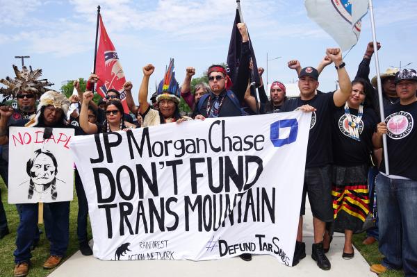 Fossil fuel financing surged to $906…