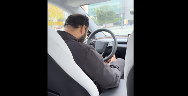 Tesla Robotaxi ‘safety driver’…