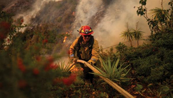 Firefighters wear wristbands to track…