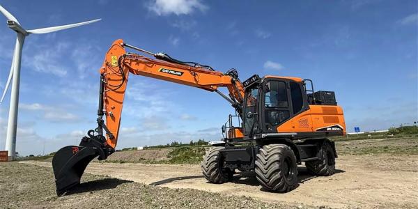 photo of DEVELON takes the wraps off new electric wheeled excavator at TKD image