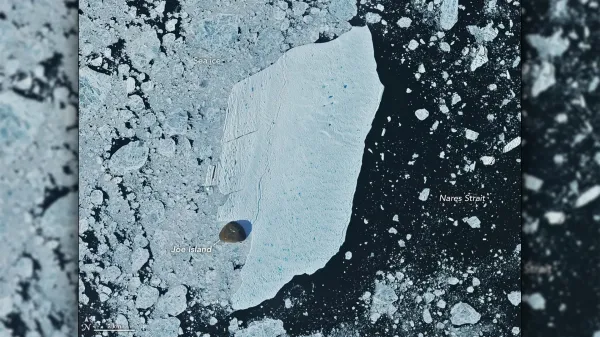 photo of Giant Greenland iceberg slams into Joe Island and survives image