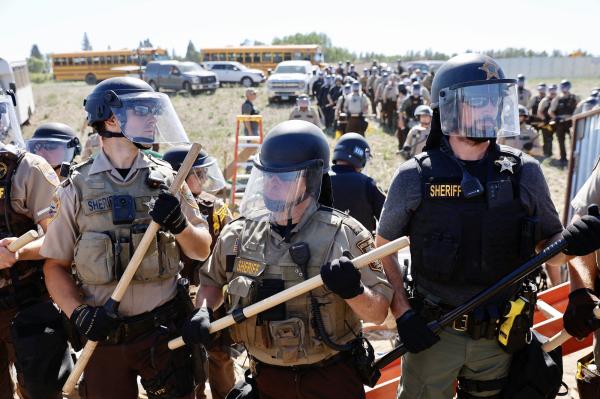 Enbridge paid police to protect one pipeline. Now it wants&hellip;